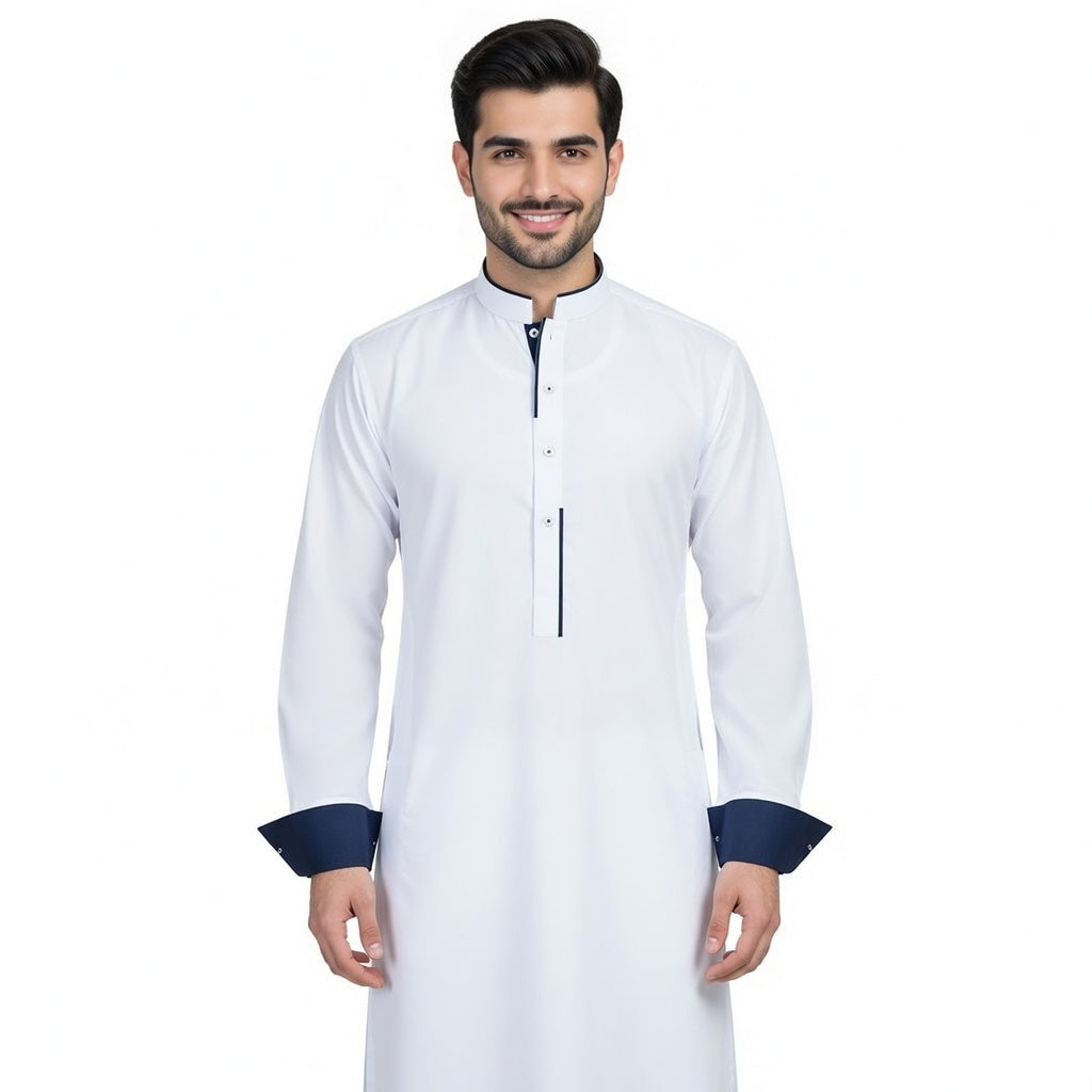 Man wearing a white kurta with navy cuffs and trim on a white background