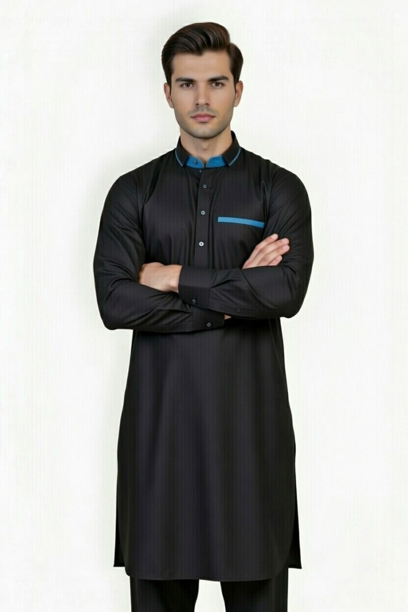 Man wearing a black kurta with a blue pocket detail on a white background