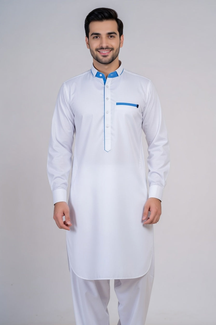 Man wearing a white kurta with blue accents on a plain background