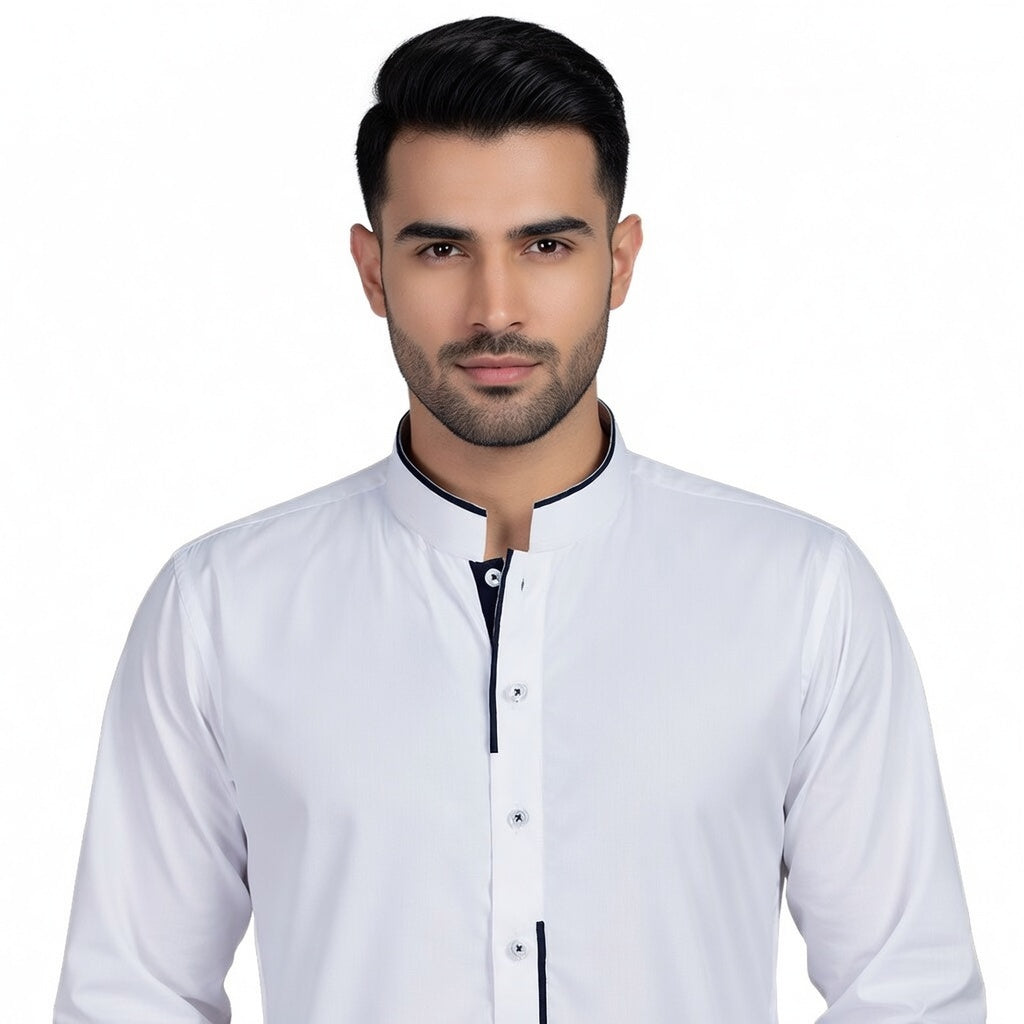 Man wearing a white shirt with black trim on a white background