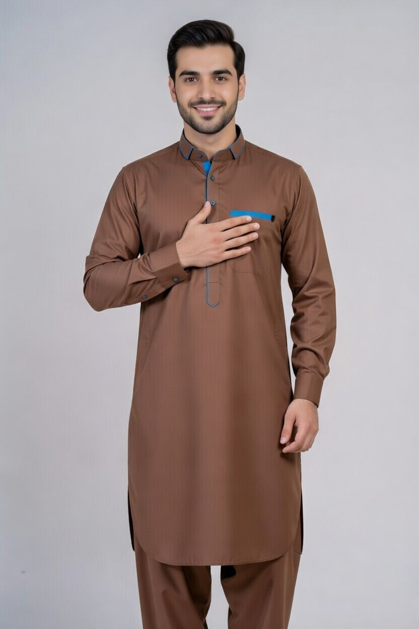 Man wearing a brown kurta with a white background