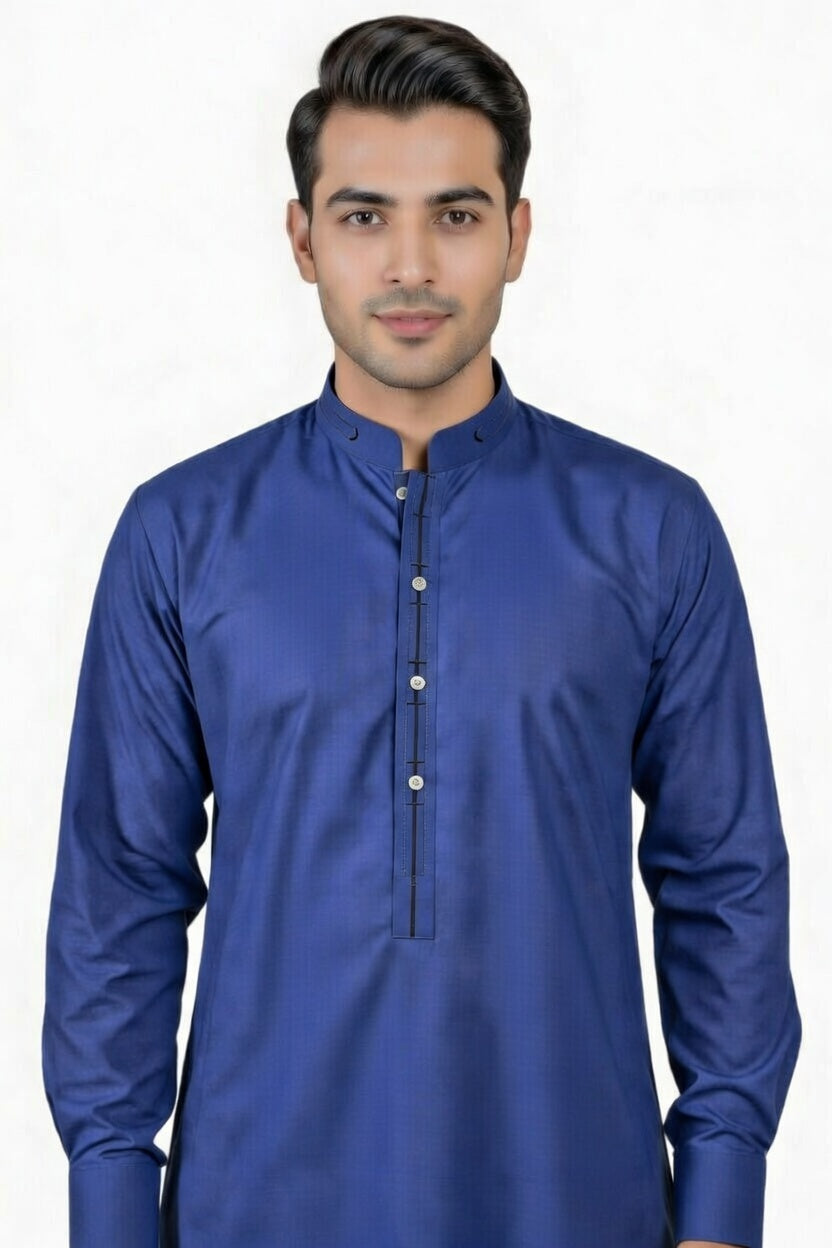 Man wearing a blue kurta against a white background