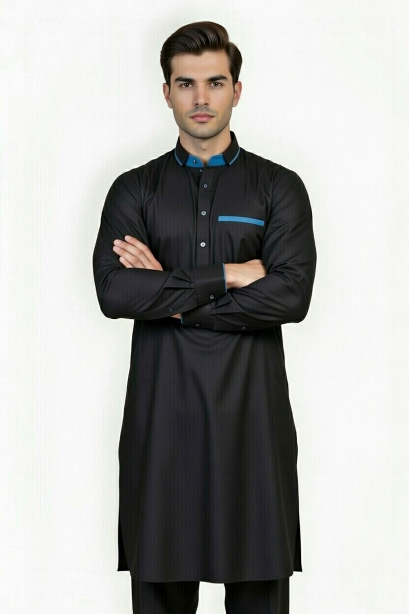 Man wearing a black kurta with blue accents on a white background