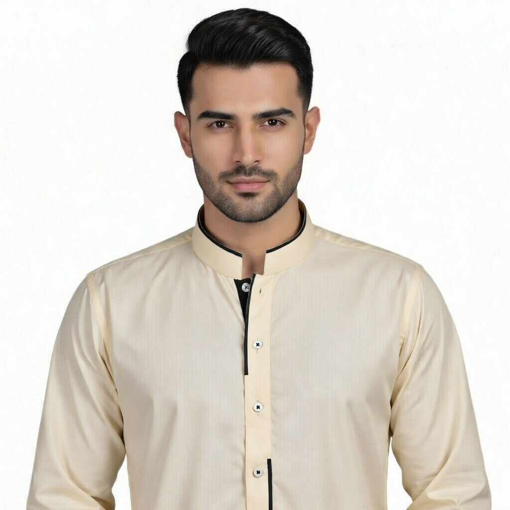 Man wearing a beige traditional outfit with a white background