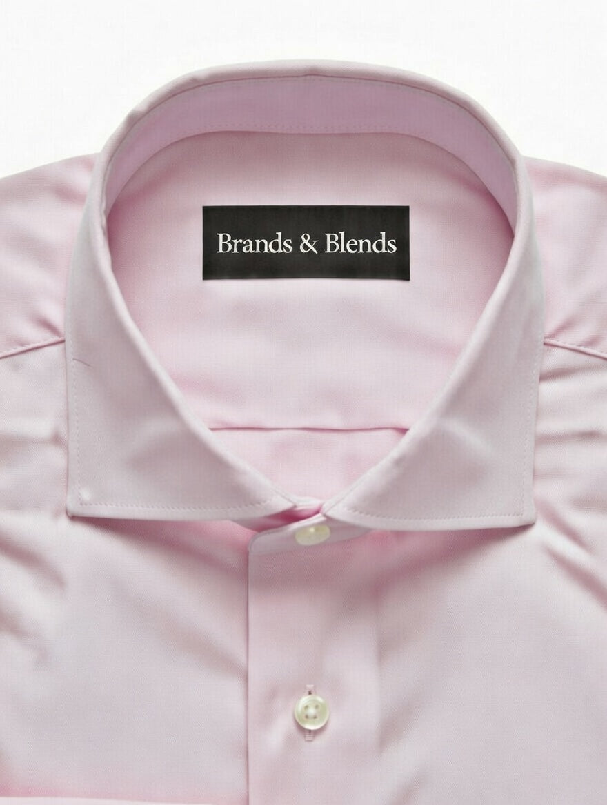 Close-up of a pink shirt collar with 'Brands & Blends' label.