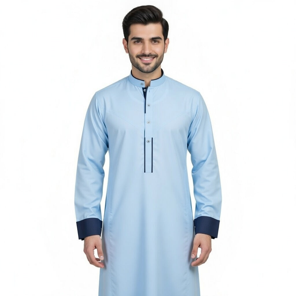 Man wearing a light blue kurta with dark cuffs and collar on a white background