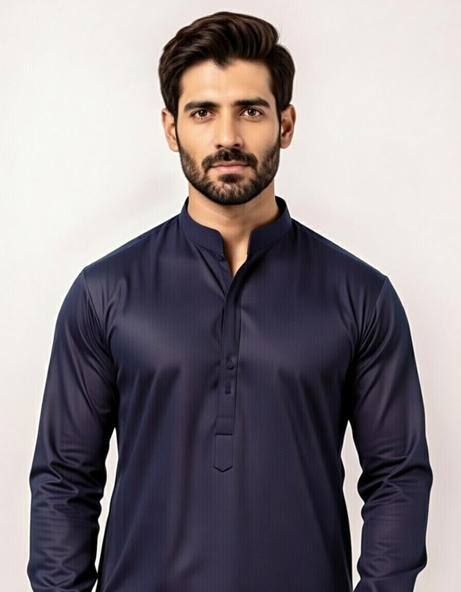 Man wearing a navy blue kurta against a white background